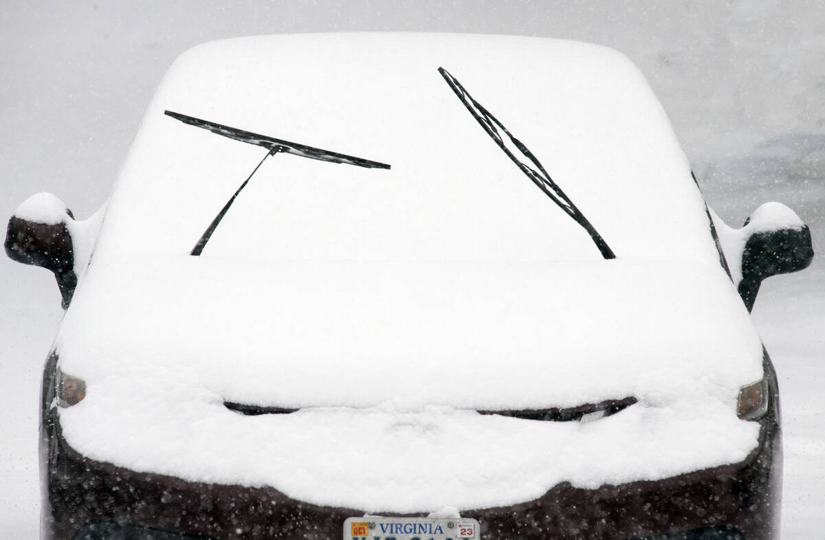 A motorist leaves wiper blades exposed in anticipation of heavy snowfall in Southwest Roanoke C ...