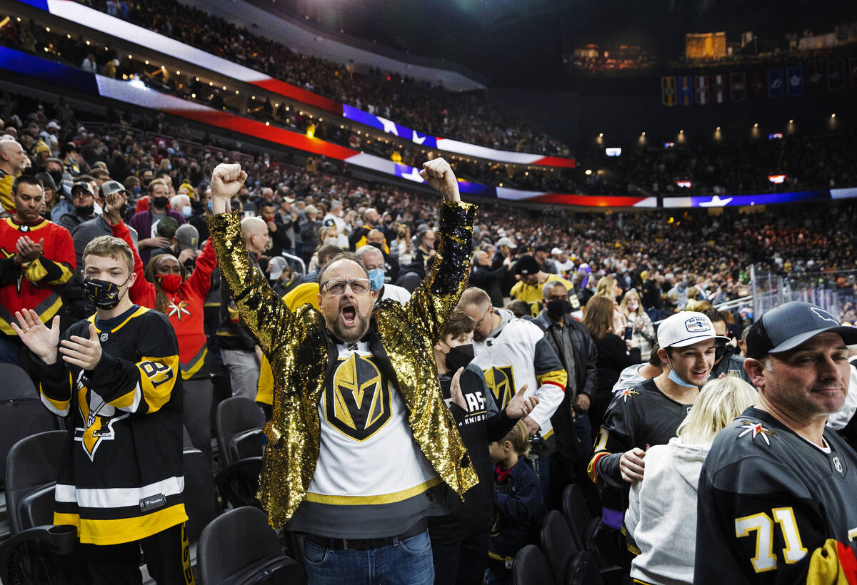 Golden Knights fans in the first period during an NHL hockey game against the Pittsburgh Pengui ...