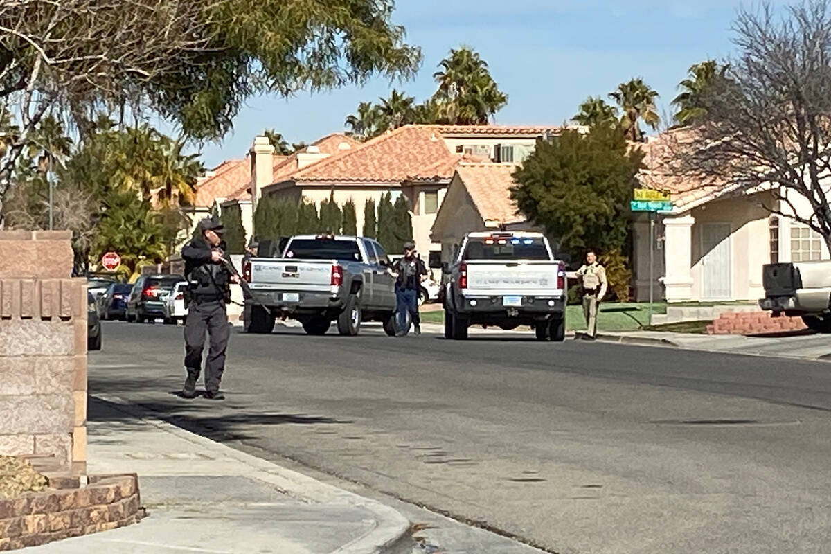 Police respond to mountain lion reported in the backyard of a residence on the 3600 block of Em ...