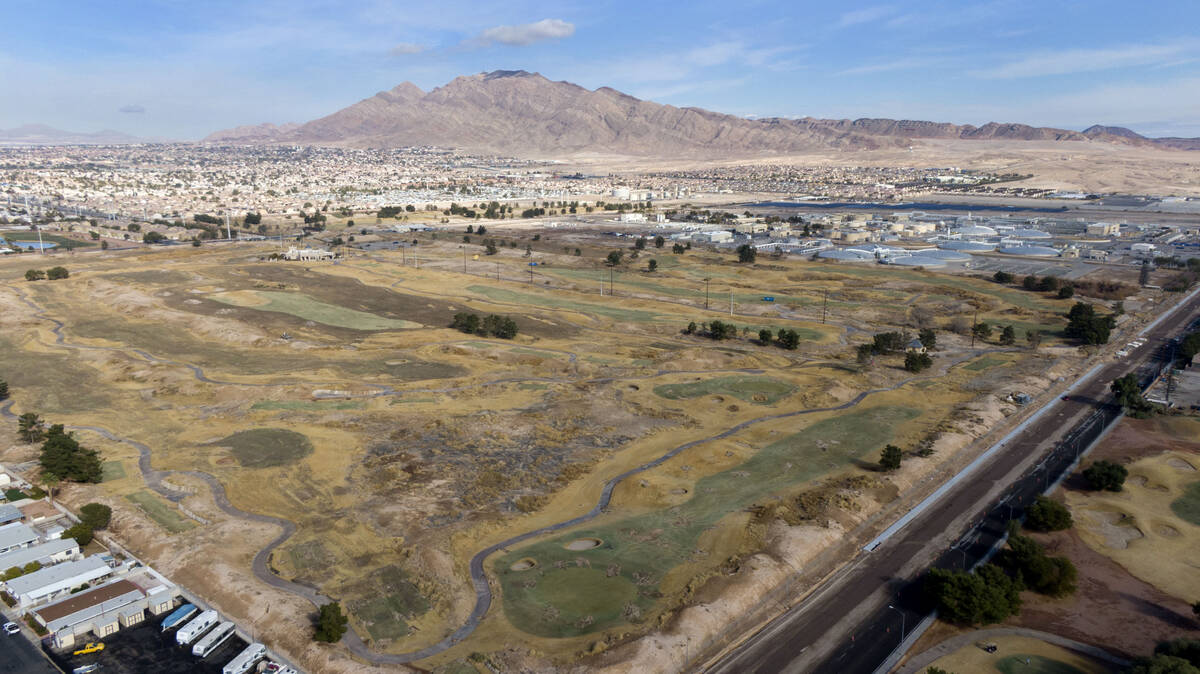 An aerial view of Royal Links Golf Club that sits adjacent to a sewage treatment plant between ...