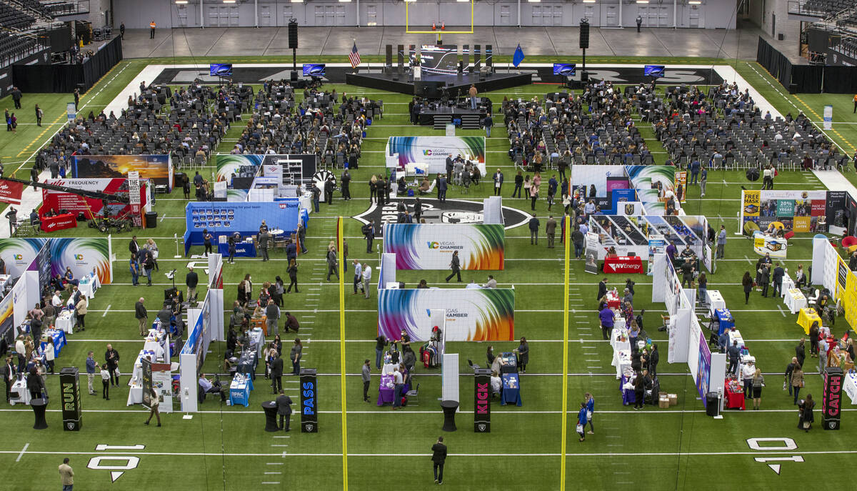 Exhibit booths and a presentation area cover the field during Preview Las Vegas sponsored by th ...