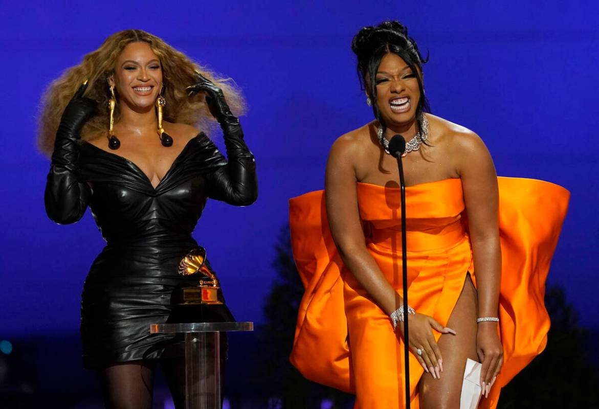 Beyonce, left, and Megan Thee Stallion accept the award for best rap song for "Savage&quot ...