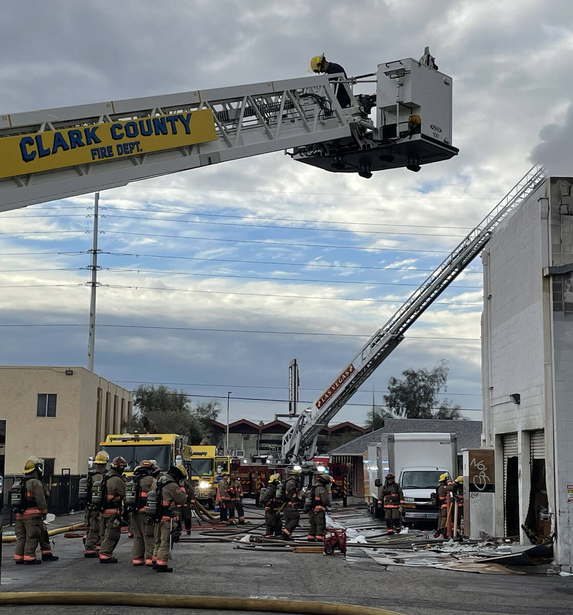 The Clark County and Las Vegas firefighters battled a large early morning fire at Statewide Lig ...