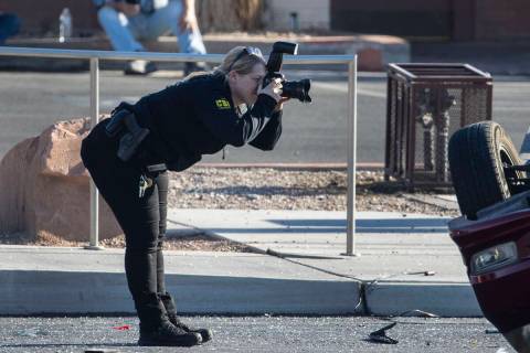 Las Vegas police are investigating after a woman was killed in a crash at the intersection of L ...