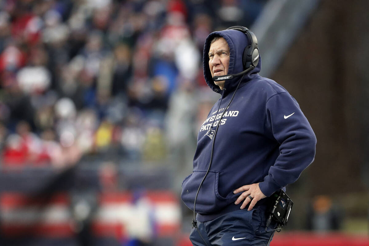 New England Patriots head coach Bill Belichick looks on during an NFL football game against the ...