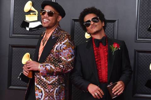 Anderson .Paak, left, and Bruno Mars, of the duo Silk Sonic, appear at the 63rd annual Grammy A ...
