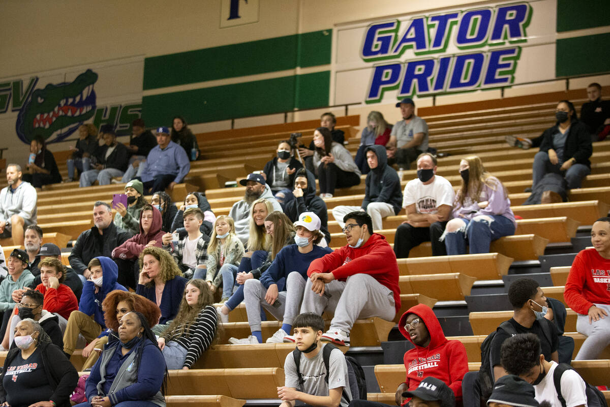 Las Vegas High School and Green Valley High School fans watch a boys high school basketball gam ...