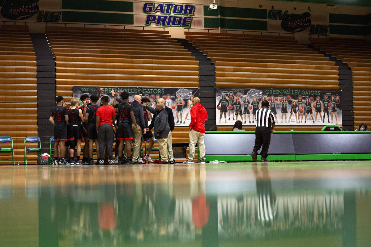 Las Vegas High School boys basketball cheers after a timeout during a boys high school basketba ...