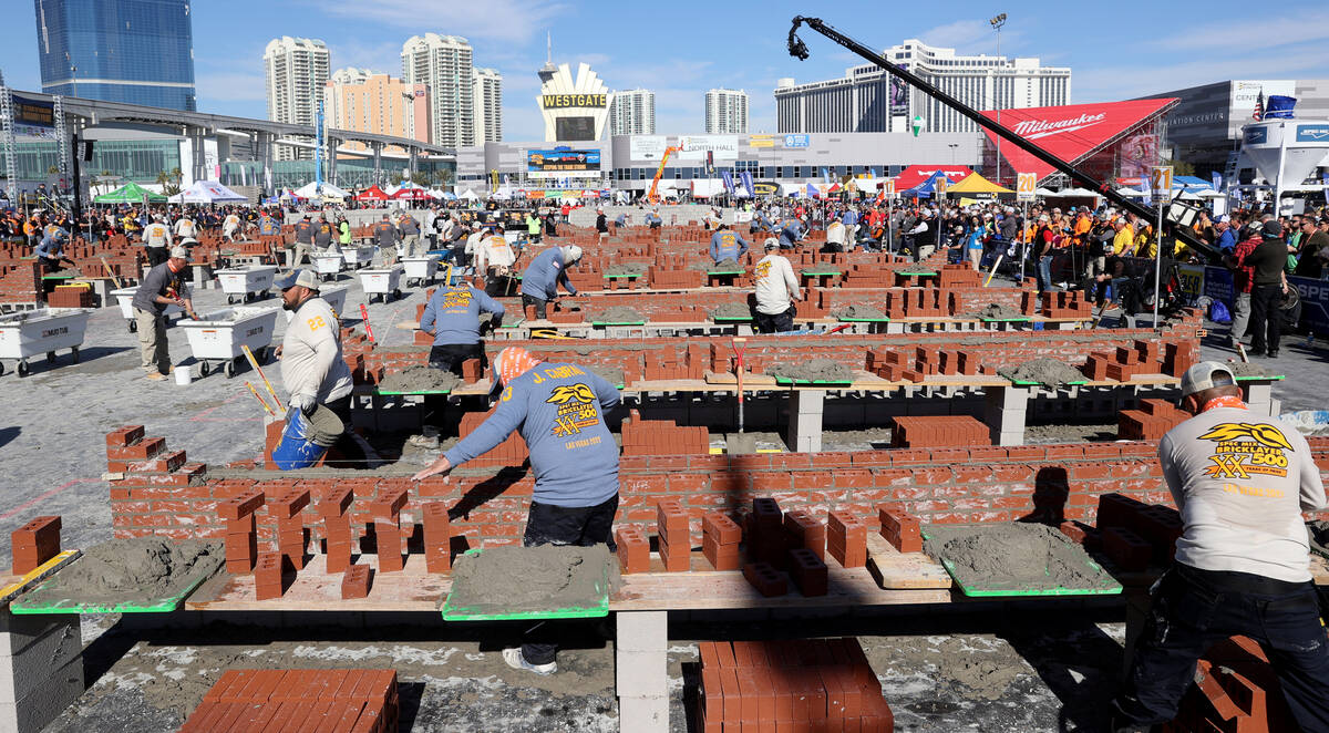 Masons compete in the Bricklayer 500 during the World of Concrete construction trade show at th ...