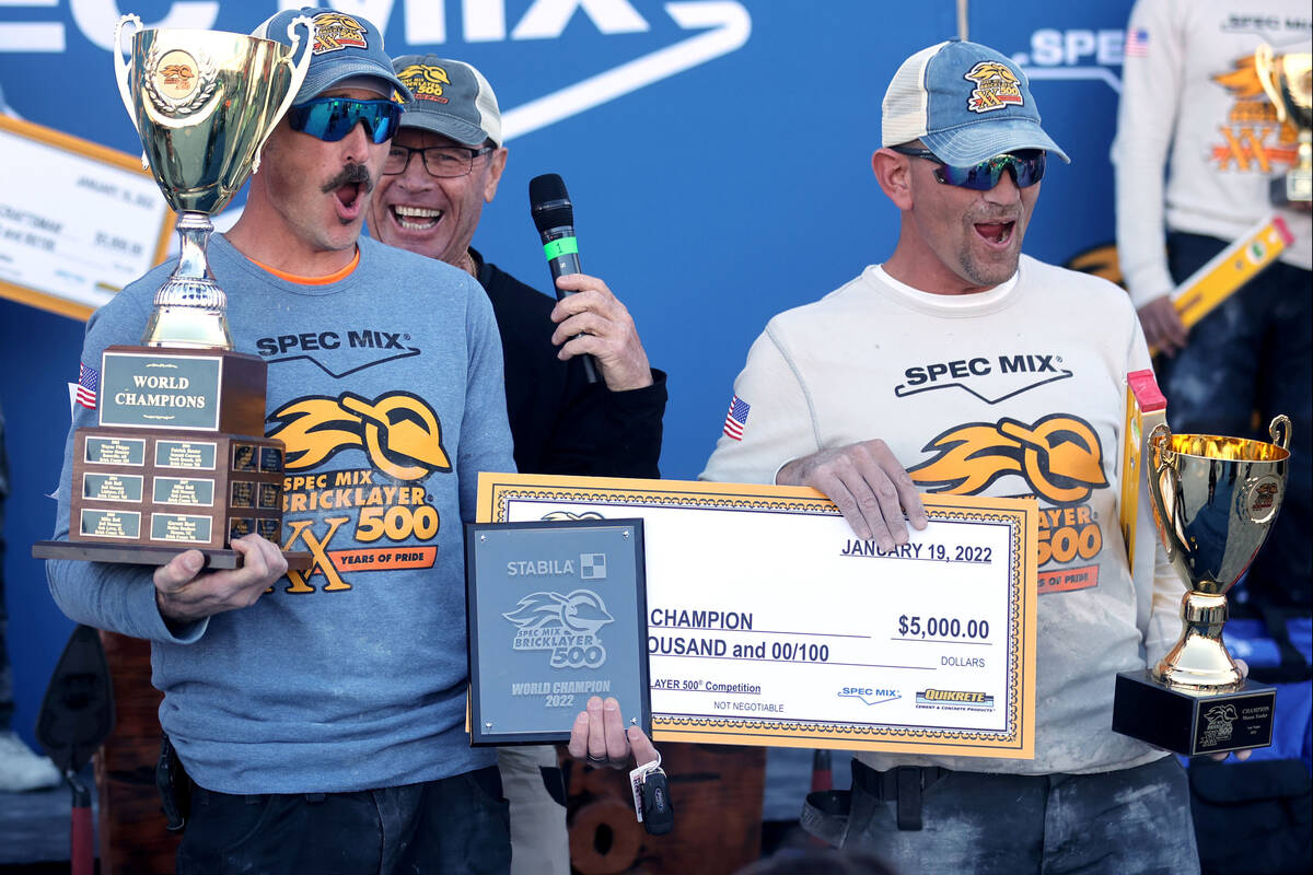 Cole Stamper of Lexington, Ky., left, and his tender Jeff Becker of Mason Structure celebrate w ...