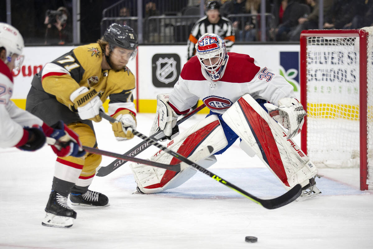 Golden Knights center William Karlsson (71) takes a shot on goal with Canadiens goaltender Sam ...