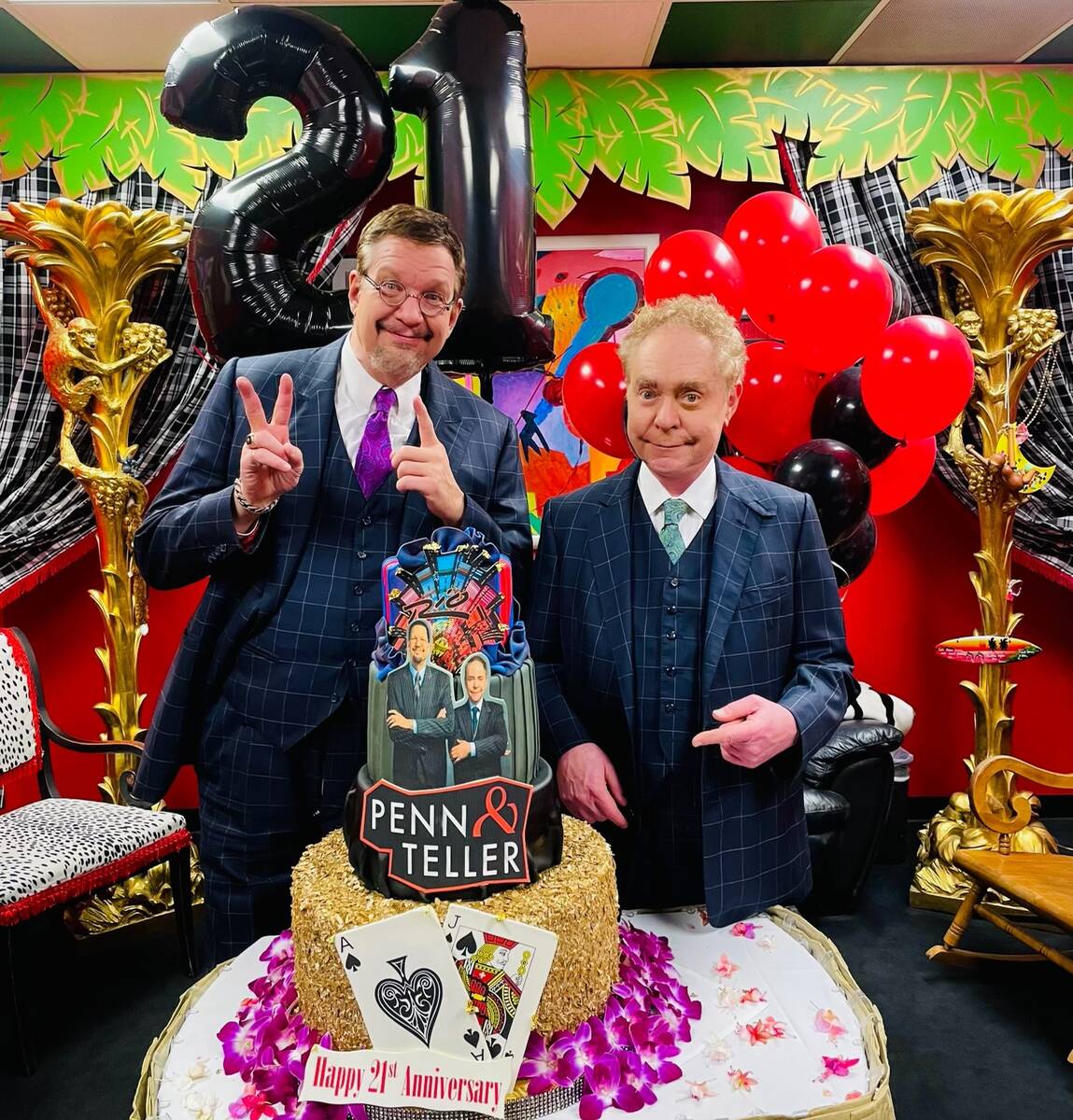 Penn & Teller are shown with their 21st anniversary cake at the Rio on Thursday, Jan. 13, 2022. ...