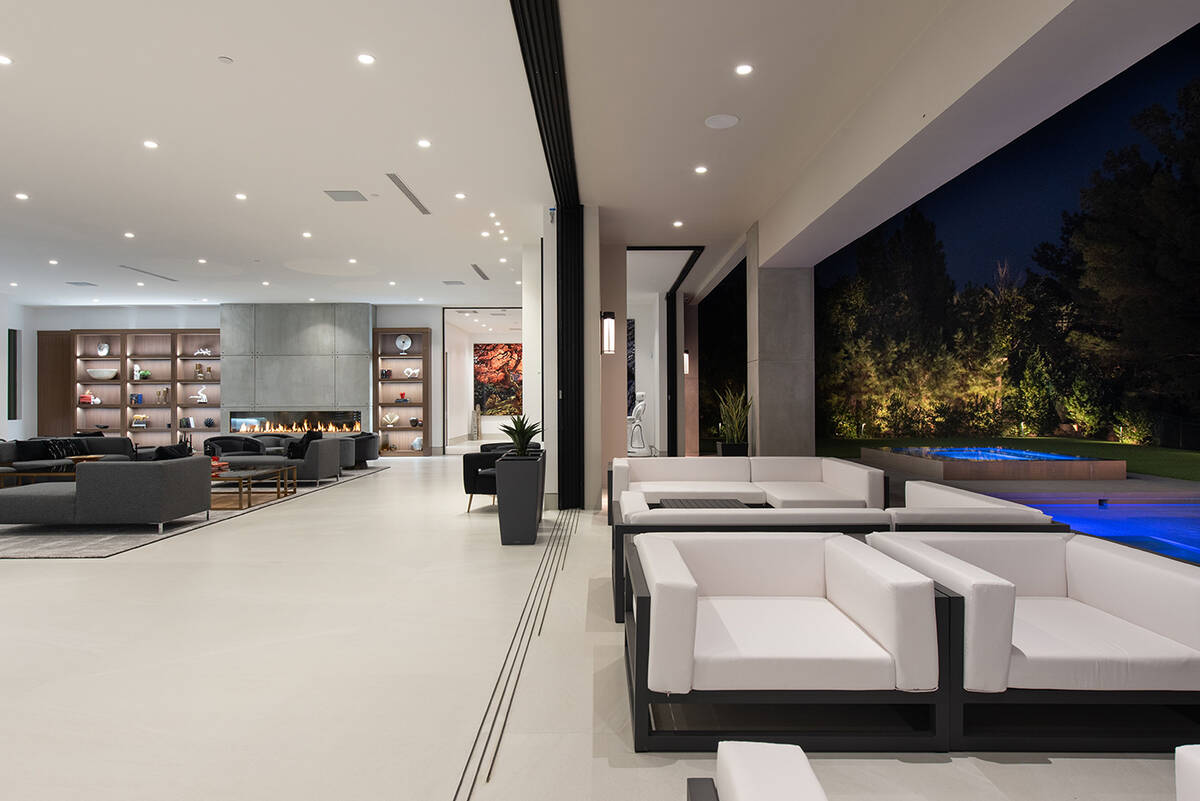 The home has outdoor/indoor living features. (Unique Custom Homes)