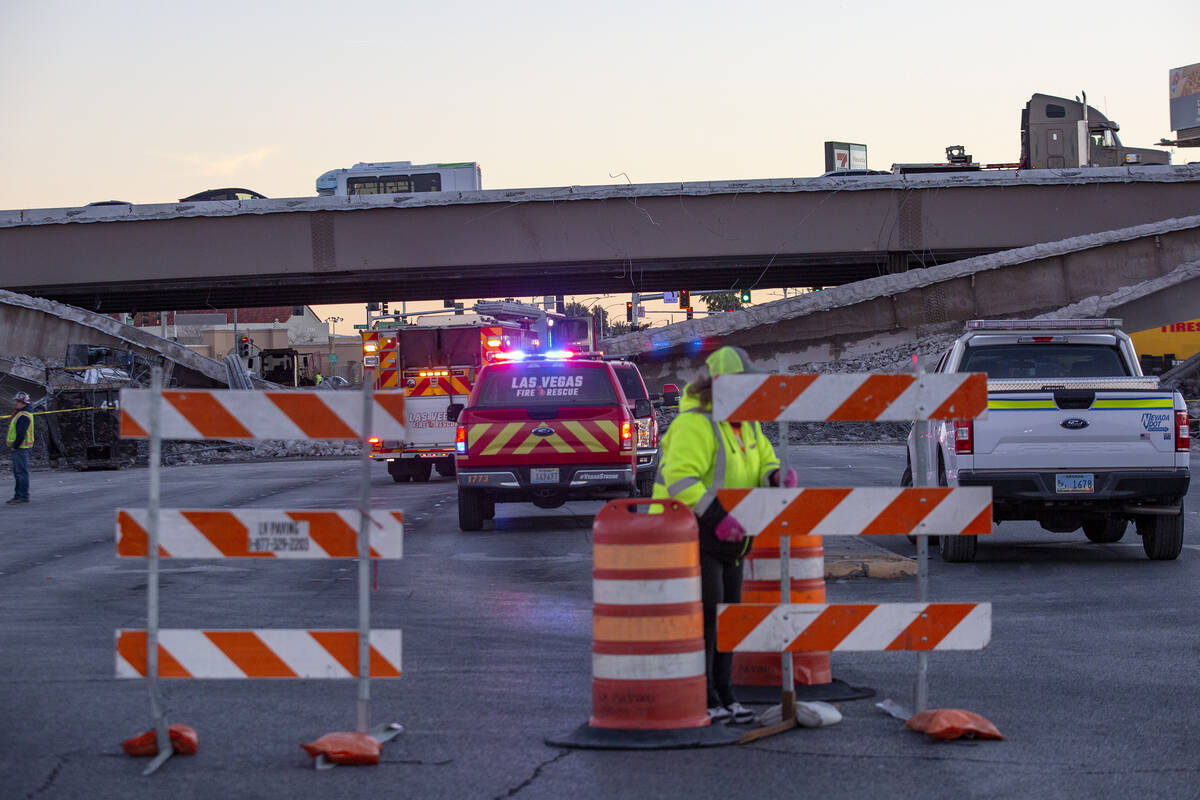 Las Vegas Fire and Rescue responds to the scene where a portion of a bridge on U.S. 95 over Nor ...