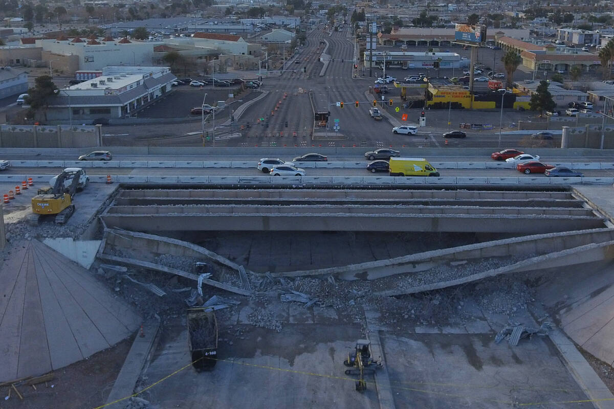 An aerial photo taken on Friday, Jan. 21, 2022, shows a portion of a bridge that was collapsed ...