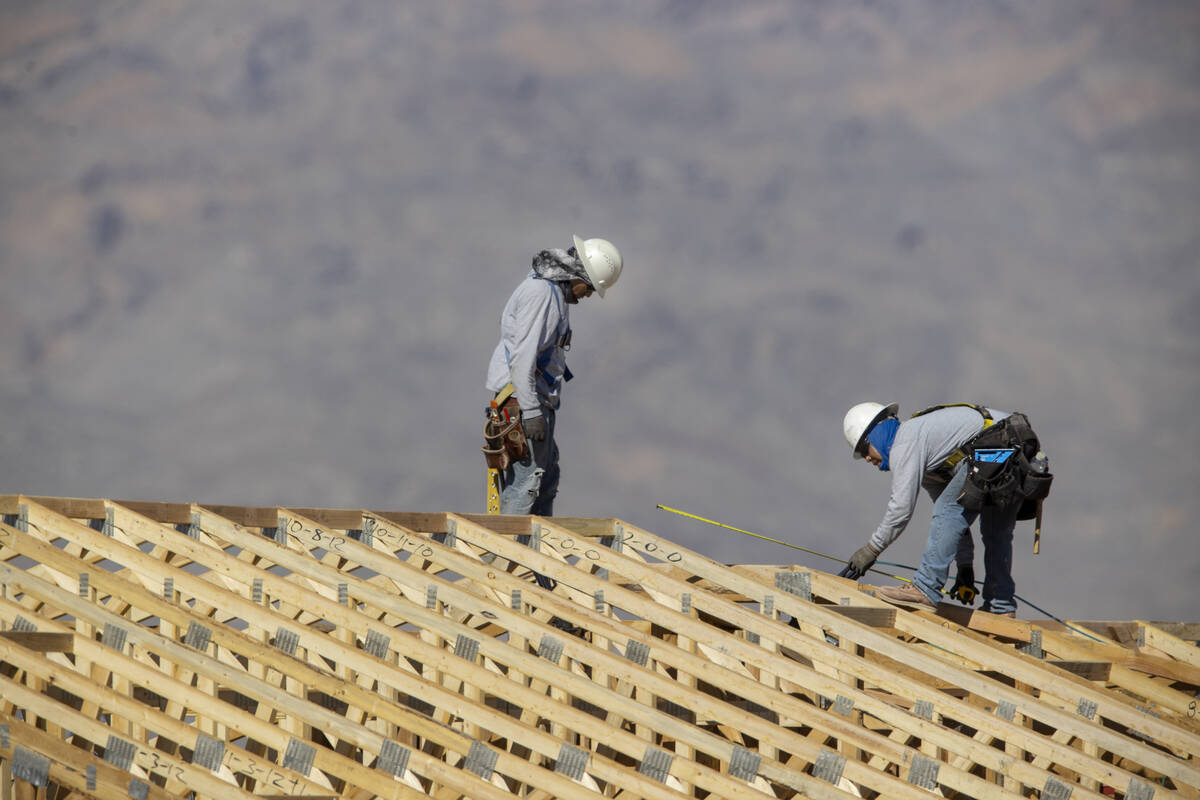 Homes under construction in the Skye Canyon master-planned community in Las Vegas, Friday, Aug. ...