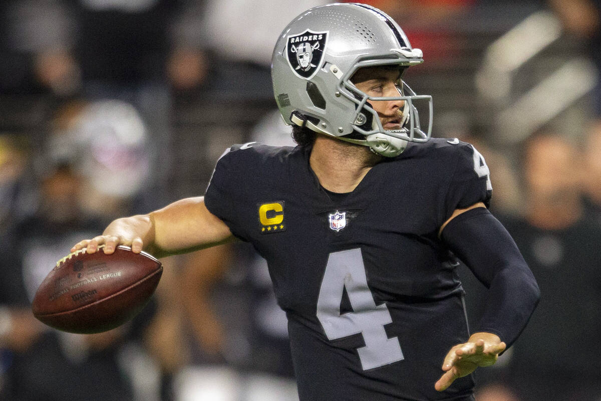 Raiders quarterback Derek Carr (4) throws the football during the first half of an NFL football ...