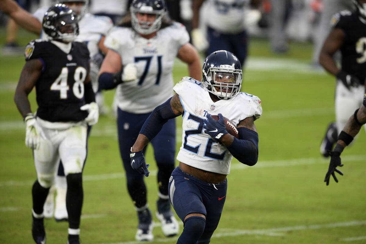 Tennessee Titans running back Derrick Henry (22) runs for a game-winning touchdown against the ...