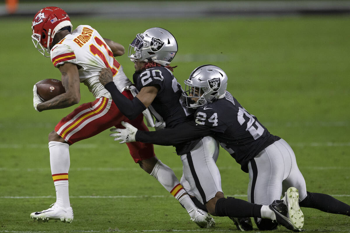 Las Vegas Raiders cornerback Damon Arnette (20) and Las Vegas Raiders strong safety Johnathan A ...