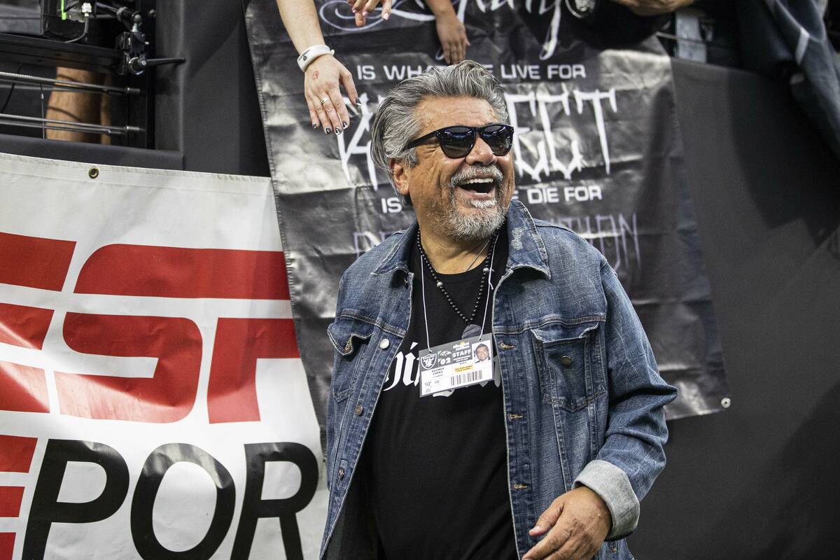 Raiders fan and celebrity comedian George Lopez cheers for Las Vegas during an NFL football gam ...