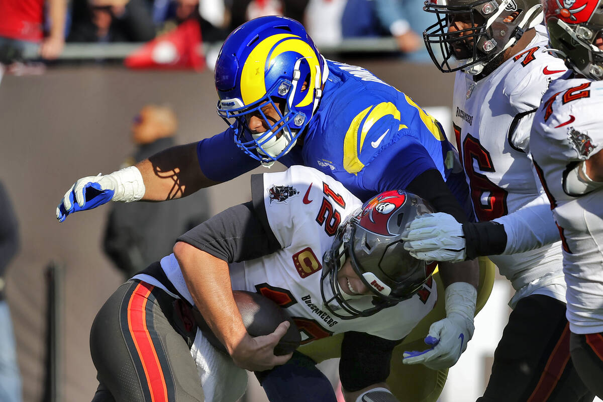 Los Angeles Rams defensive end Aaron Donald (99) sacks Tampa Bay Buccaneers  quarterback Tom Bra …