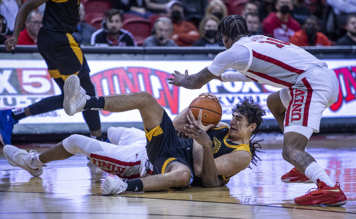 San Jose State Spartans guard Alvaro Cardenas Torre (13) and UNLV Rebels guard Bryce Hamilton ( ...