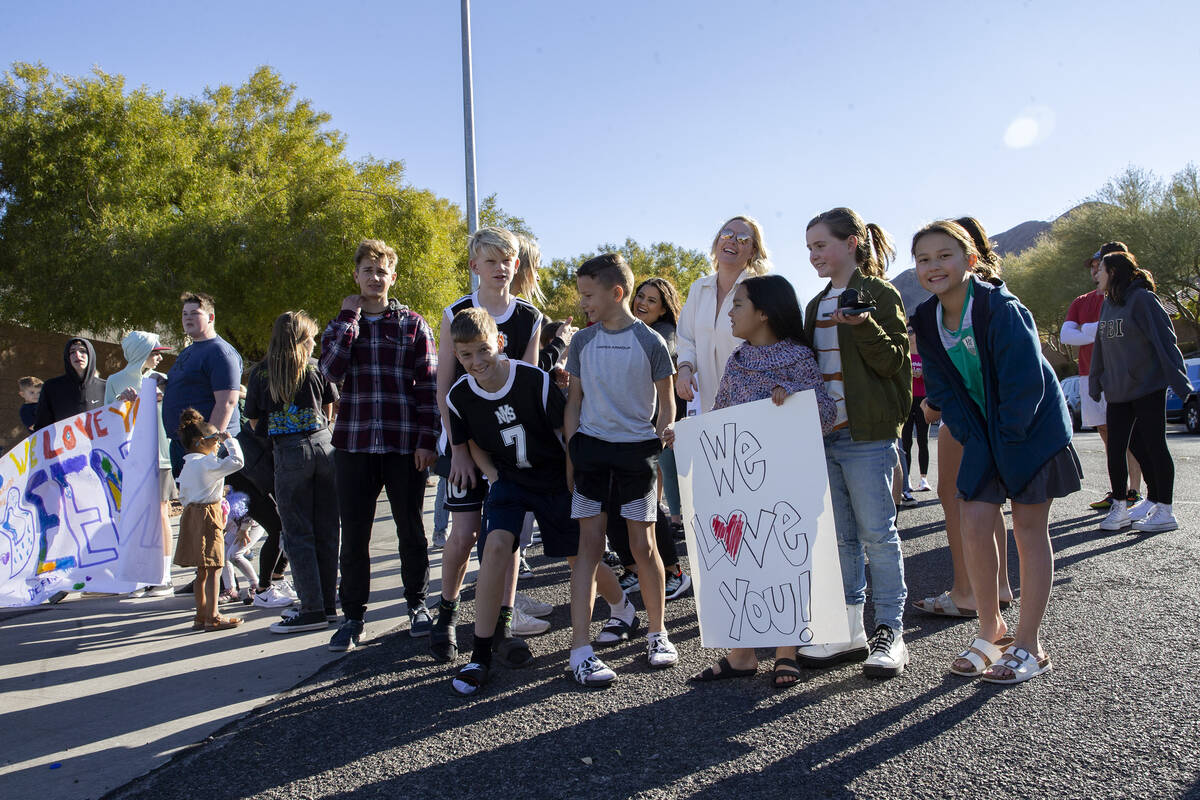 A group gathers to welcome Deedra Russell, who is returning home with her family after 136 nigh ...