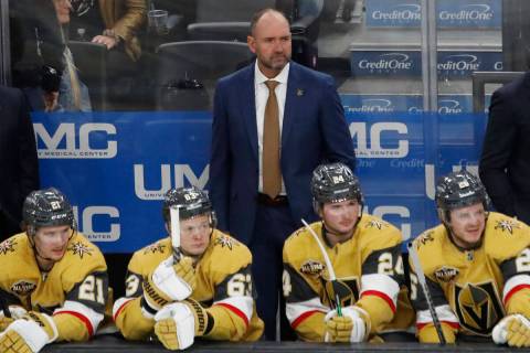 Golden Knights head coach Pete DeBoer watch his players during the third period of an NHL hocke ...