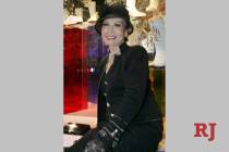 Designer Anna Nateece poses in a St. John's oufit that she added her own sequins and buttons to ...