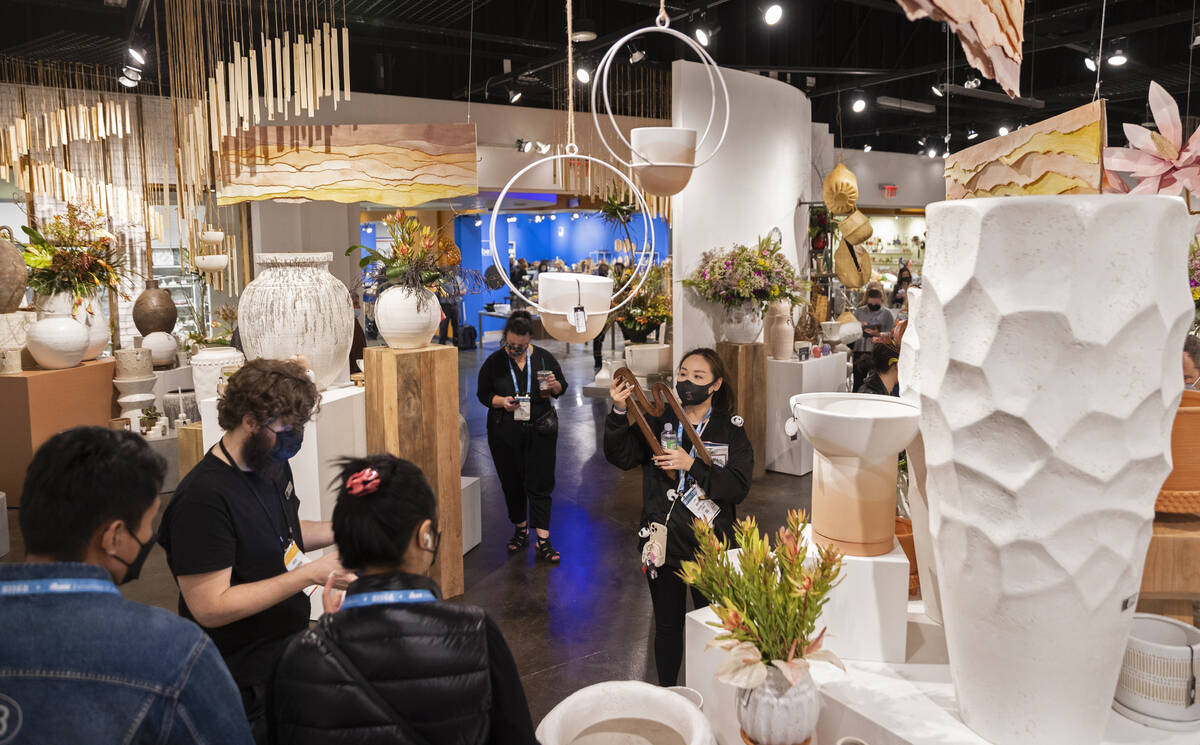 Shoppers browse at Accent Decor during the Las Vegas Market at World Market Center Las Vegas on ...