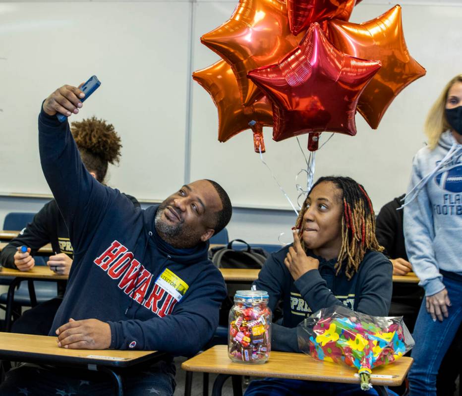 Spring Valley High School basketball guard Aaliyah Gayles, right, takes a “selfie&#x201d ...