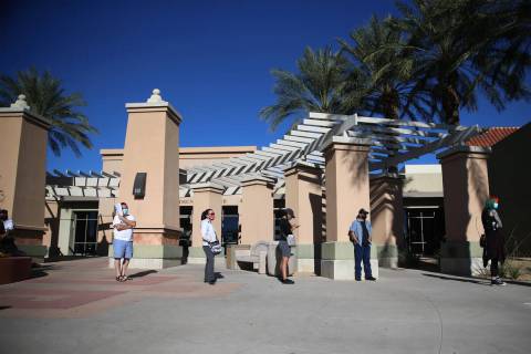 People line up to vote at the East Las Vegas Community Center polling location in Las Vegas, Sa ...