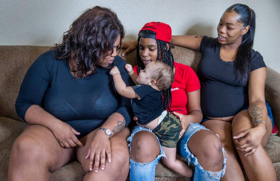 Imani Jones with her son Jay'zon Jones, sister Kall'y Scott, 15, and fiancee Montrese Fletcher ...