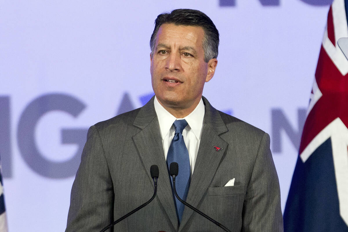 FILE - This Feb. 24, 2018, file photo shows then-Gov. Brian Sandoval of Nevada at the National ...