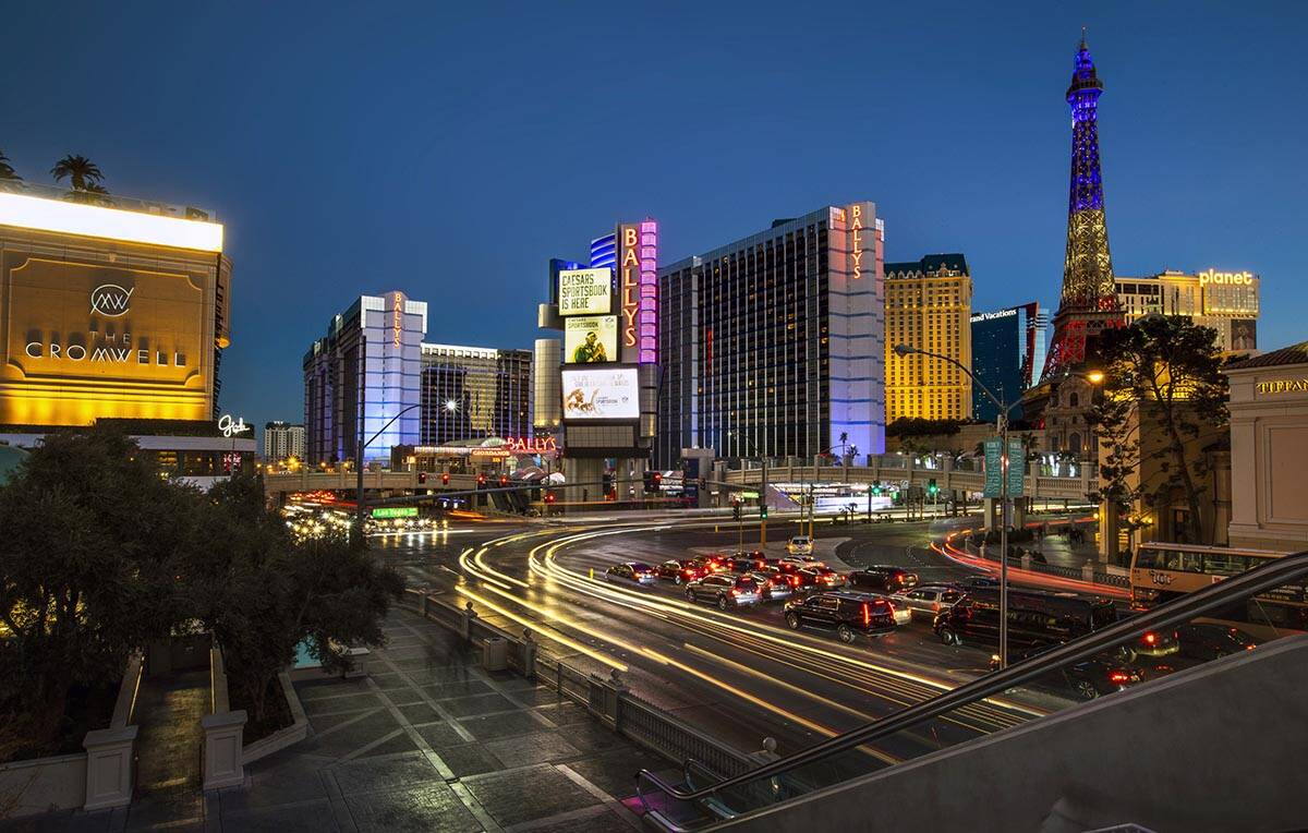 Cars stream along East Flamingo Road near the exterior of Bally’s Las Vegas which will b ...