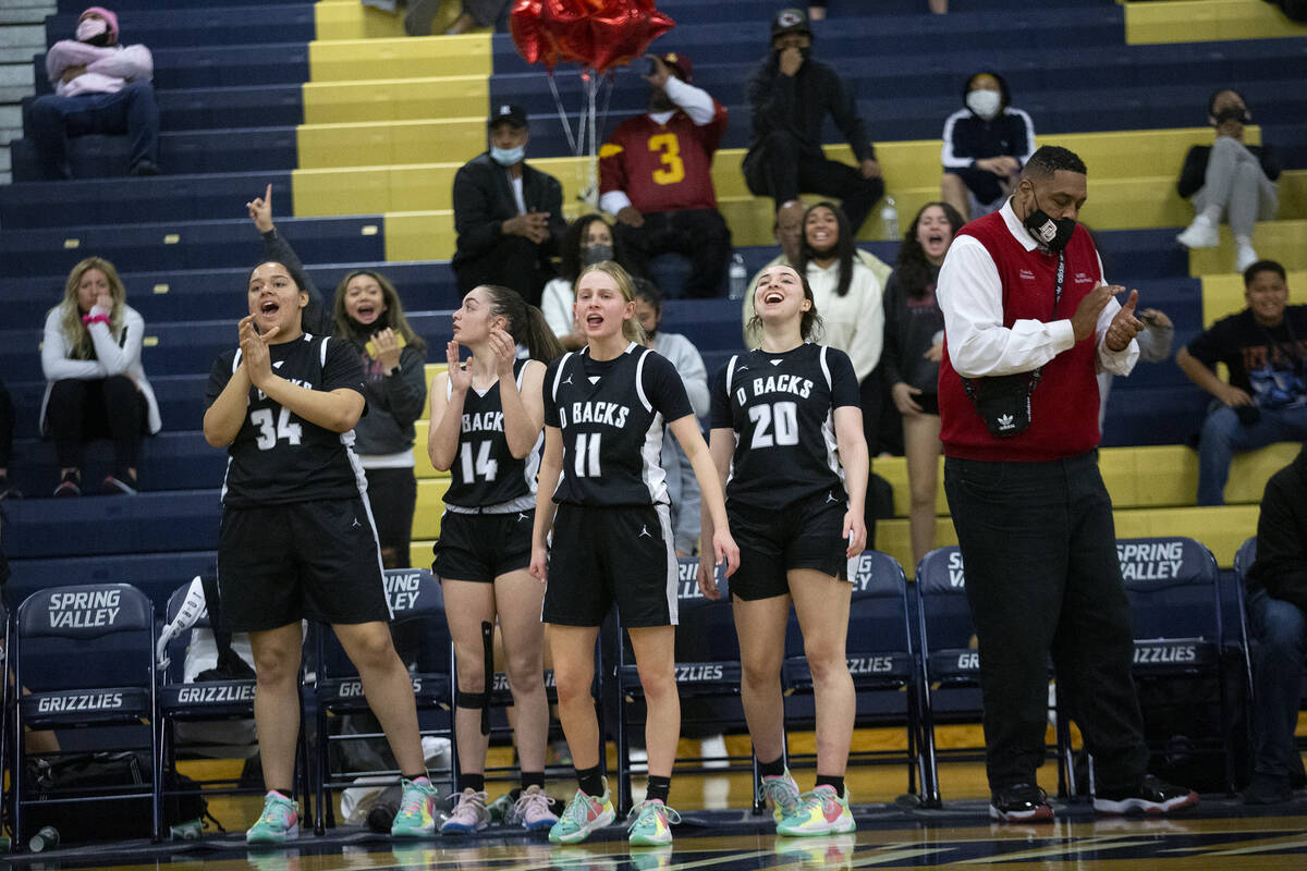 The Desert Oasis bench cheers as their team takes the lead in the last minute of a girls high s ...