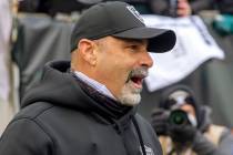 Raiders interim head coach Rich Bisaccia gives an interview on the field before an NFL playoff ...