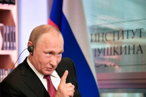 FILE - In this Monday, May 29, 2017 photo released by the Sputnik news agency, Russian Presiden ...