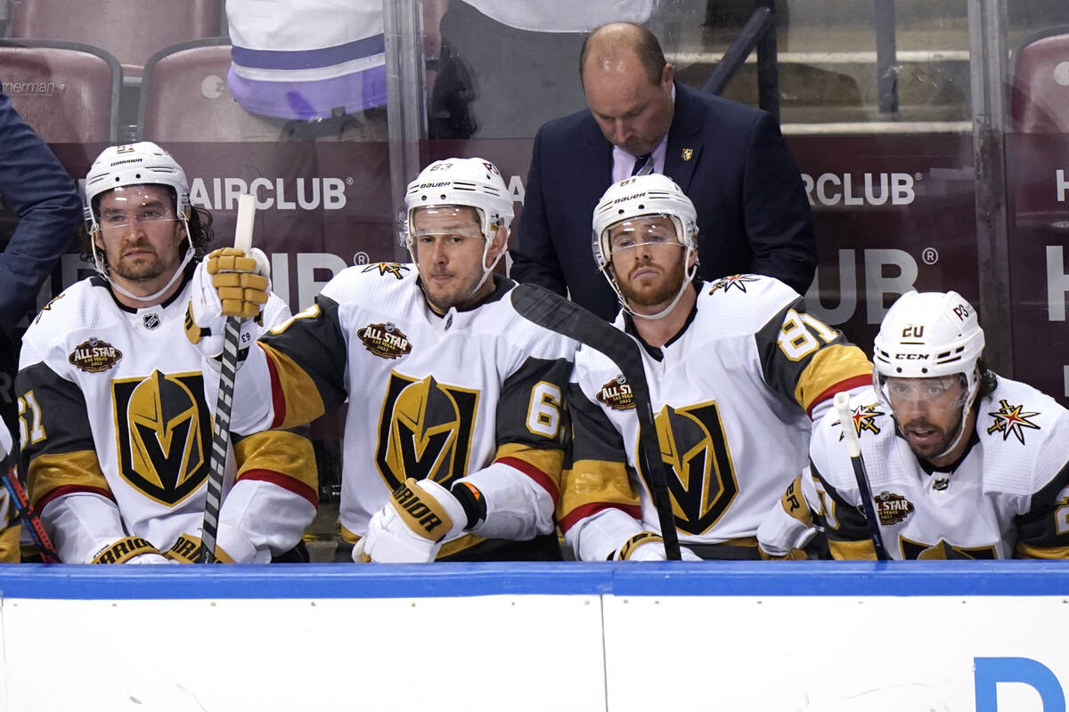 Vegas Golden Knights right wing Evgenii Dadonov, second from left, center Jonathan Marchessault ...