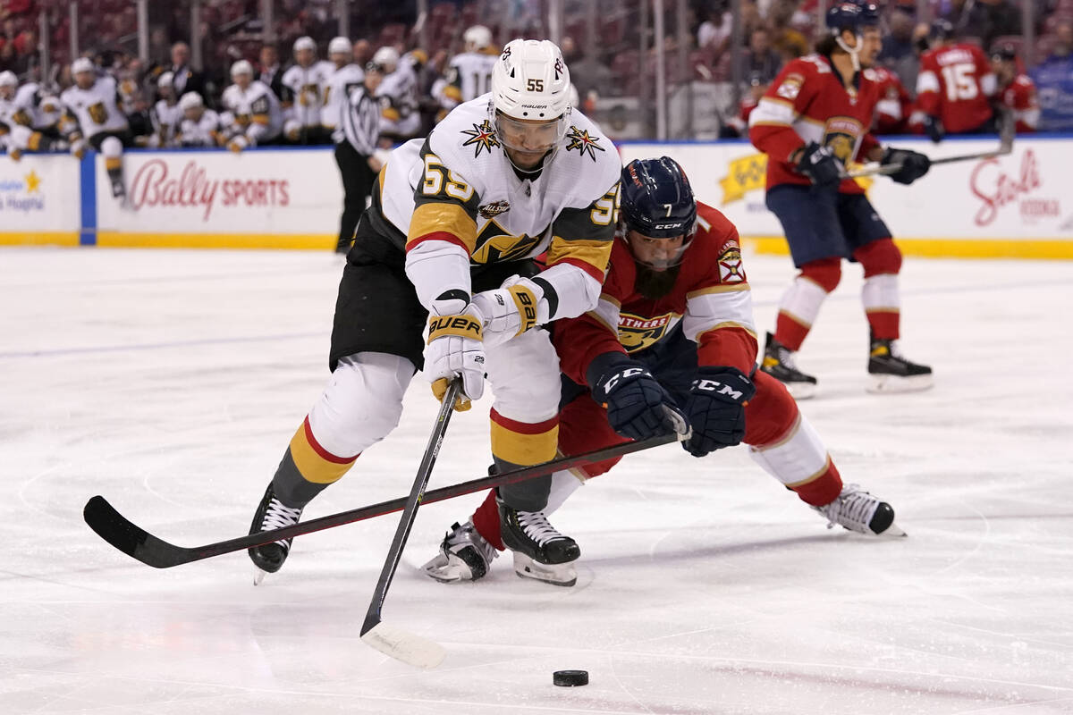 Vegas Golden Knights right wing Keegan Kolesar (55) and Florida Panthers defenseman Radko Gudas ...