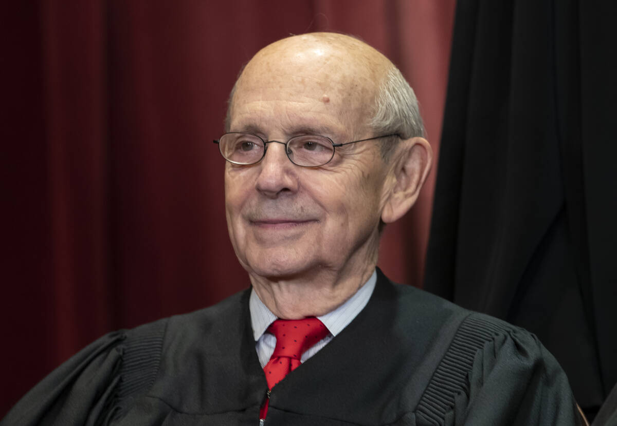 Supreme Court Associate Justice Stephen Breyer, appointed by President Bill Clinton, sits with ...