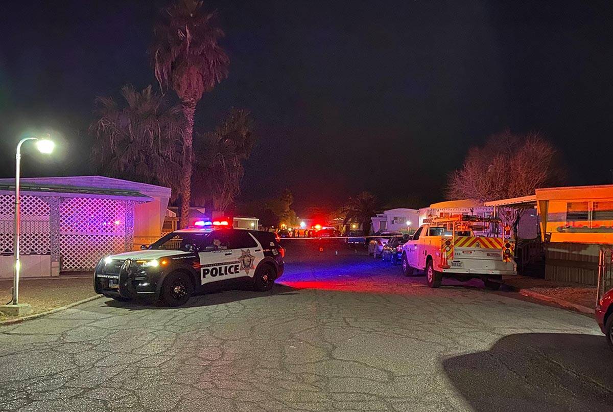 Las Vegas police at the scene of a mobile home fire on South Mojave Road on Wednesday, Jan. 26, ...