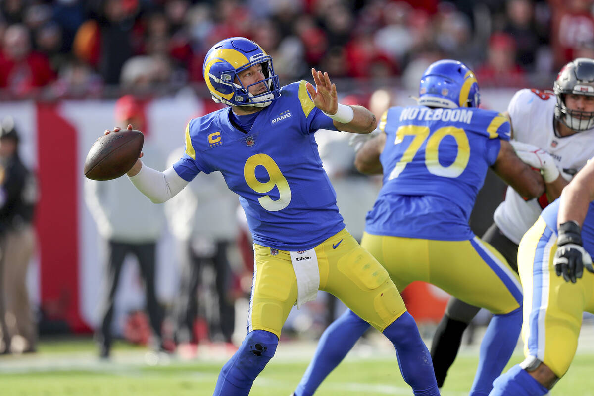 Los Angeles Rams quarterback Matthew Stafford (9) attempts a pass during a NFL divisional playo ...