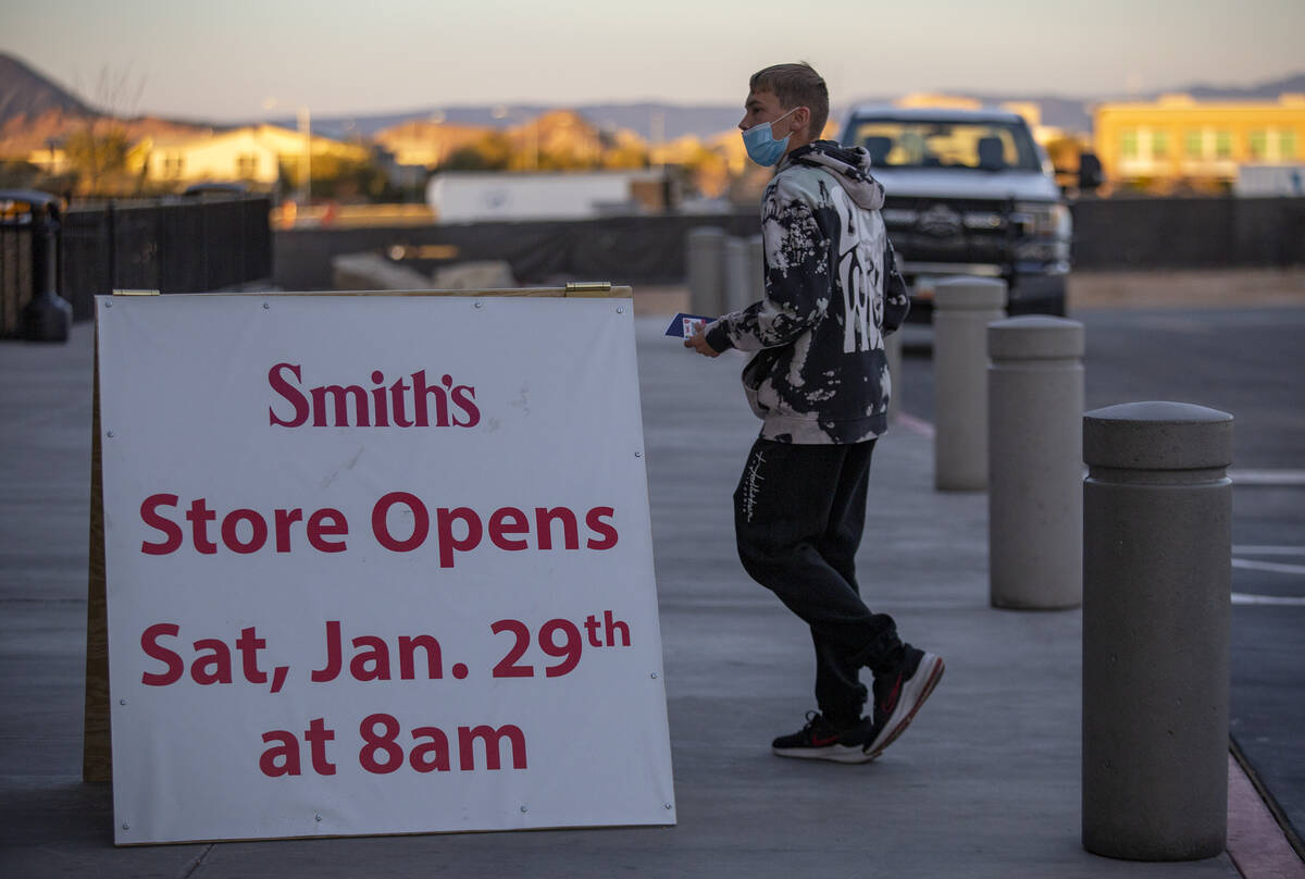 A customer walks into the the new Smith’s Marketplace at 845 East Lake Mead Parkway duri ...