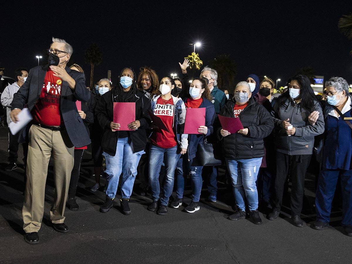 Ted Pappageorge, left, president of Culinary Workers Union, Local 226, joins the Culinary Union ...