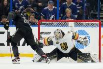 Vegas Golden Knights goaltender Robin Lehner (90) makes a save on a shot by Corey Perry of the ...