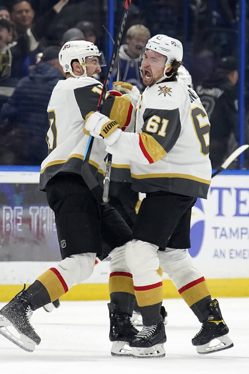 Vegas Golden Knights right wing Mark Stone (61) celebrates with center Nicolas Roy after Stone ...
