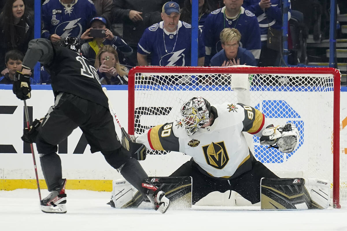 Vegas Golden Knights goaltender Robin Lehner (90) makes a save on a shot by Corey Perry of the ...