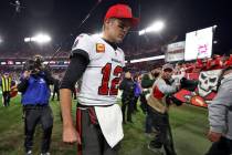 Tampa Bay Buccaneers quarterback Tom Brady (12) reacts as he leaves the field after the team lo ...