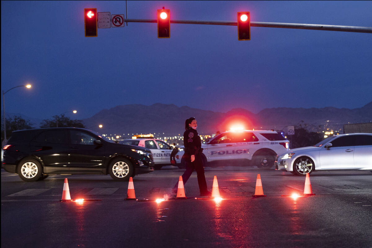 Roads are blocked off on West Cheyenne Avenue as North Las Vegas police respond to a deadly cra ...